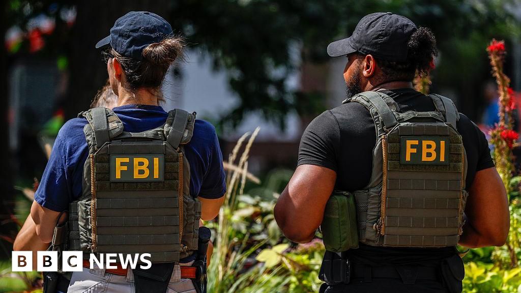 FBI dismisses agents seen kneeling at George Floyd protest, reports say