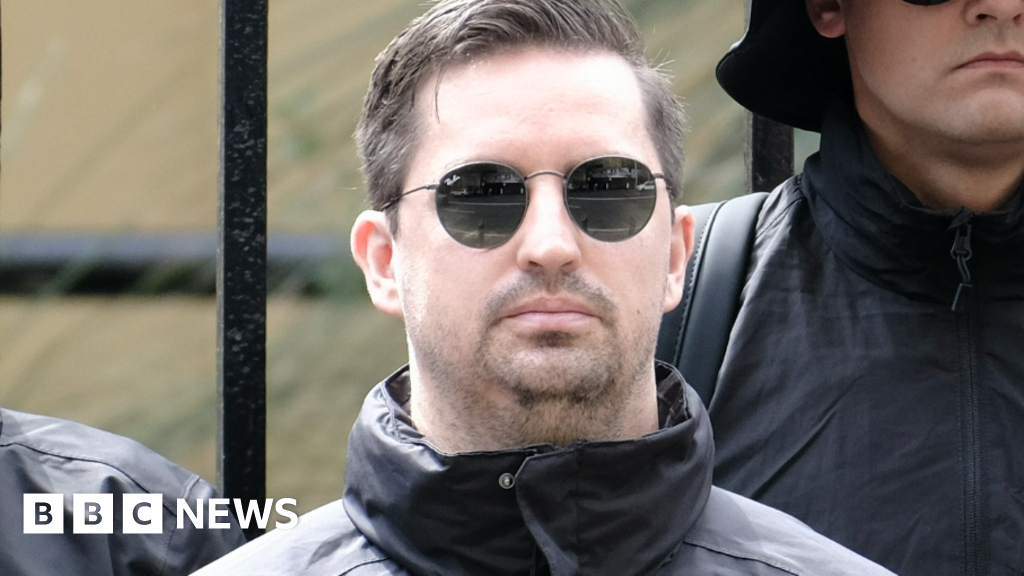 South African man caught at neo-Nazi rally loses Australian visa, protecting our values