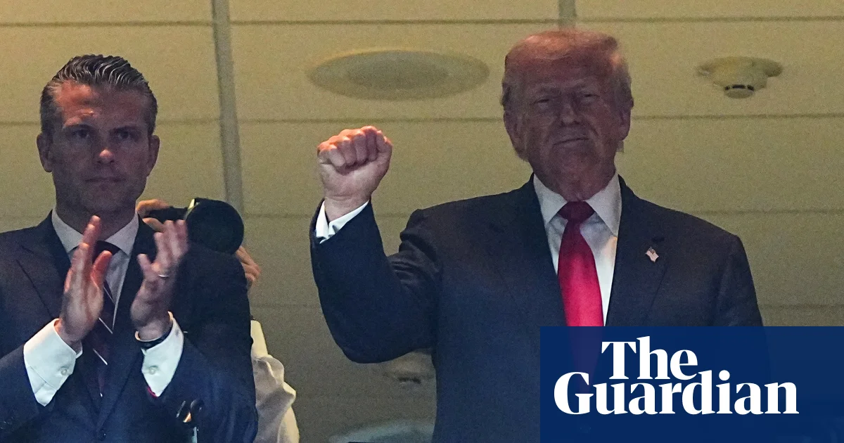 Trump booed at Commanders game before taking over Fox broadcast booth to call plays