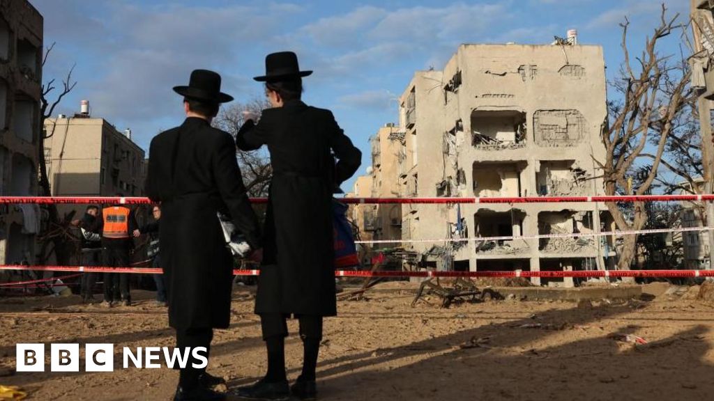 Iranian missile strikes target town near Israeli nuclear site, injuring 160 residents