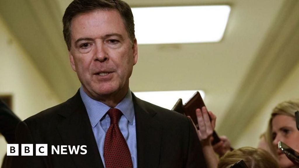 Former FBI chief James Comey turns himself in over alleged Instagram threat against Trump
