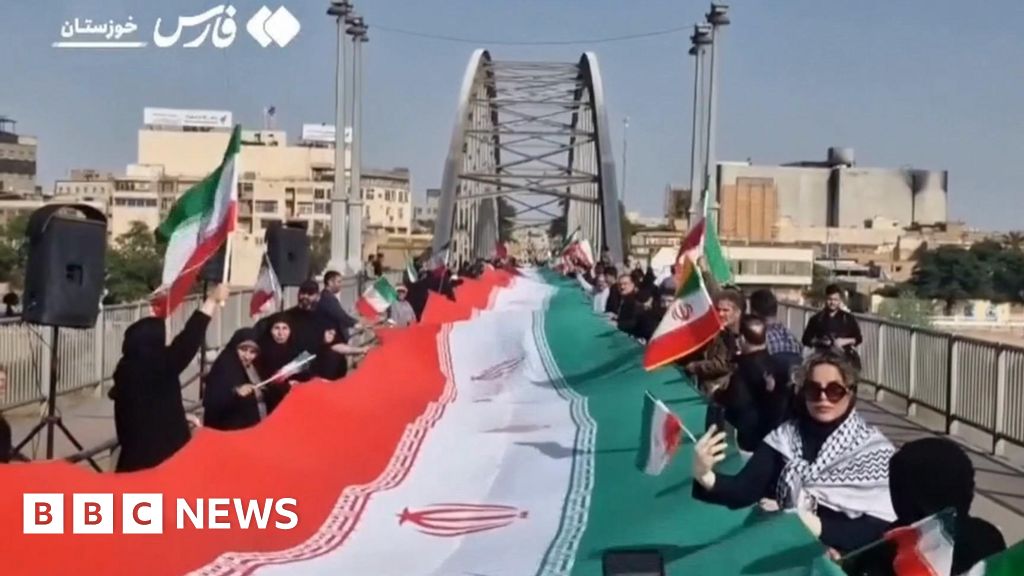 Iranians rally together, forming human chains at bridges and power plants to stand up for their future